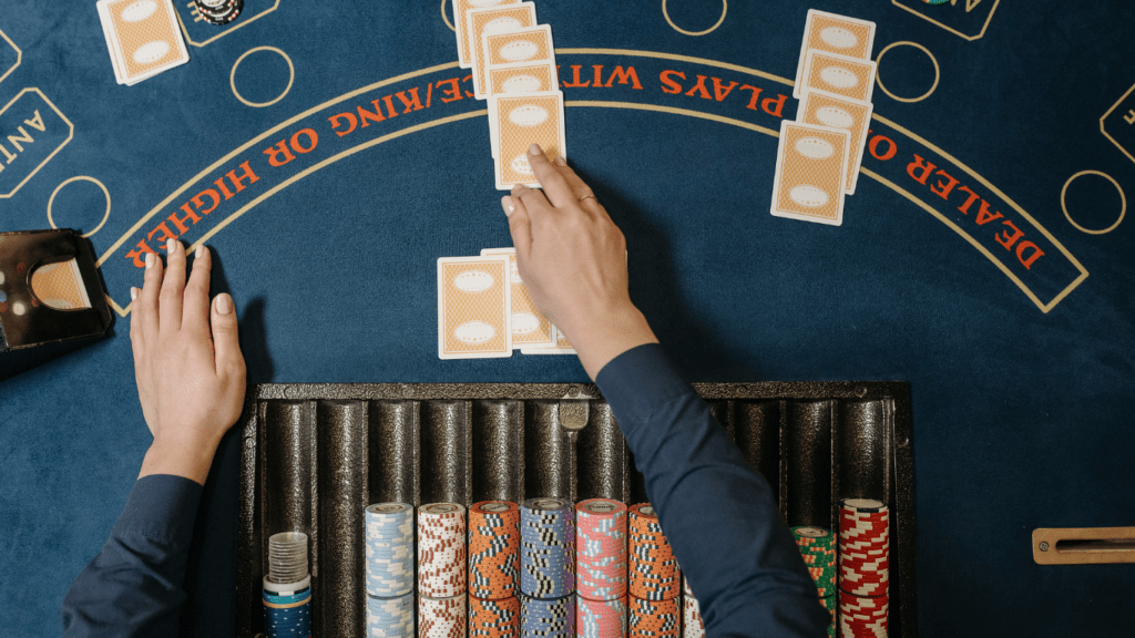 A person playing roulette at a casino