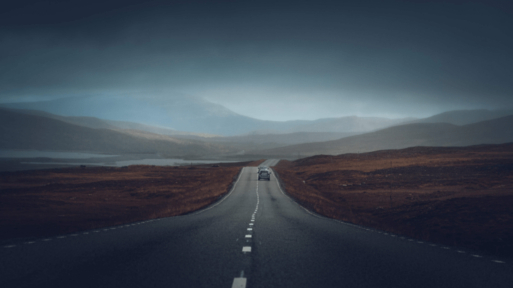 an empty road in the middle of nowhere