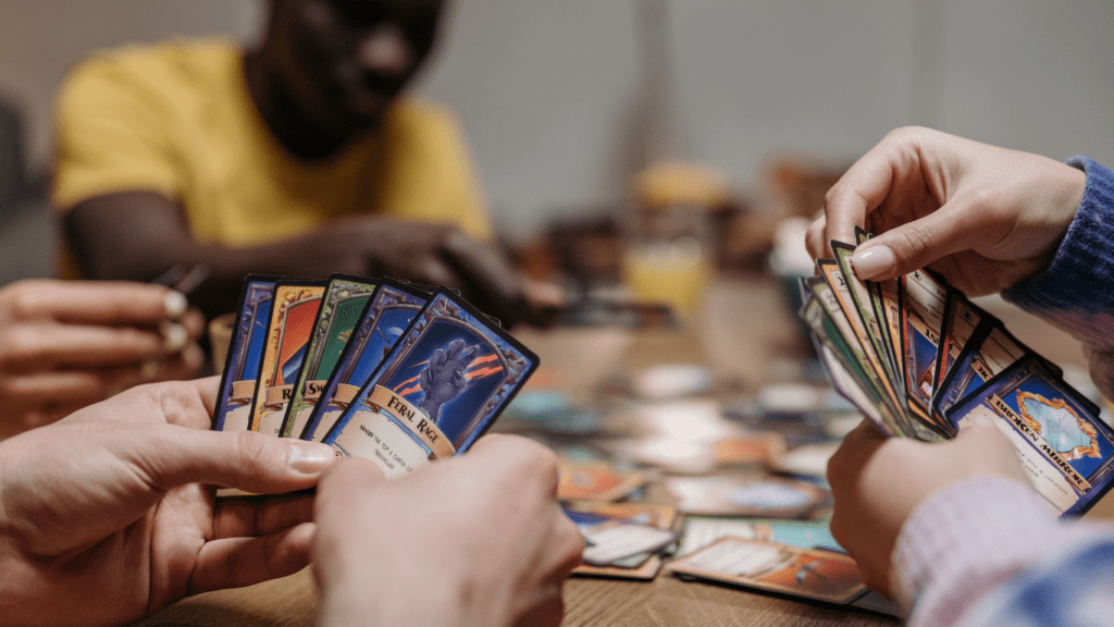 a group of people playing cards at a table