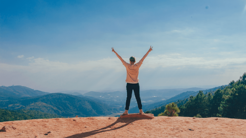 a person raising their hand