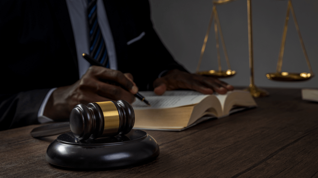 judge's gavel on a desk in a courtroom